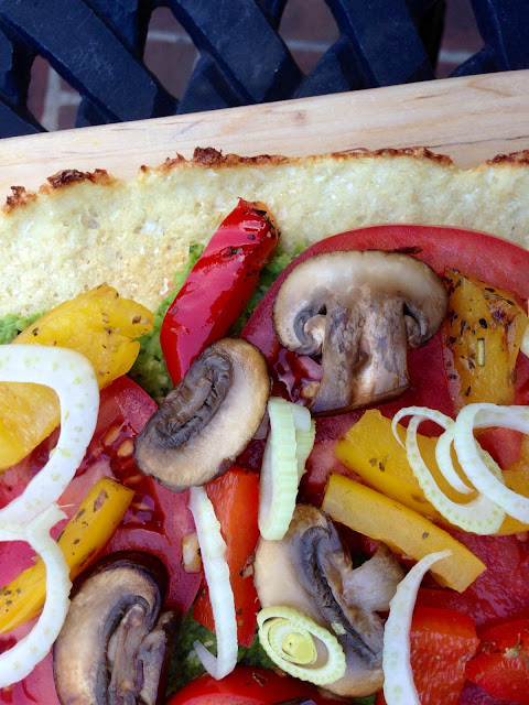 A delicious gluten free, vegan and paleo with a cauliflower pizza crust!