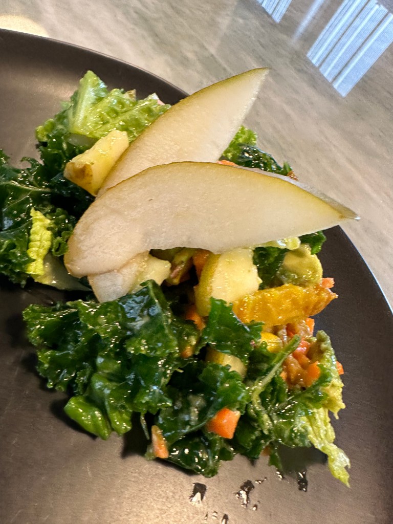 Feast your eyes on my delicious Pear and Pistachio Kale Salad with Champagne Vinaigrette! A sweet and savory salad that will become your new favorite! Healthy never tasted so good! #glutenfree #paleo #healthyfood #salad #kale #health #specificcarbohydratediet #goodfood #food #recipe #yum
