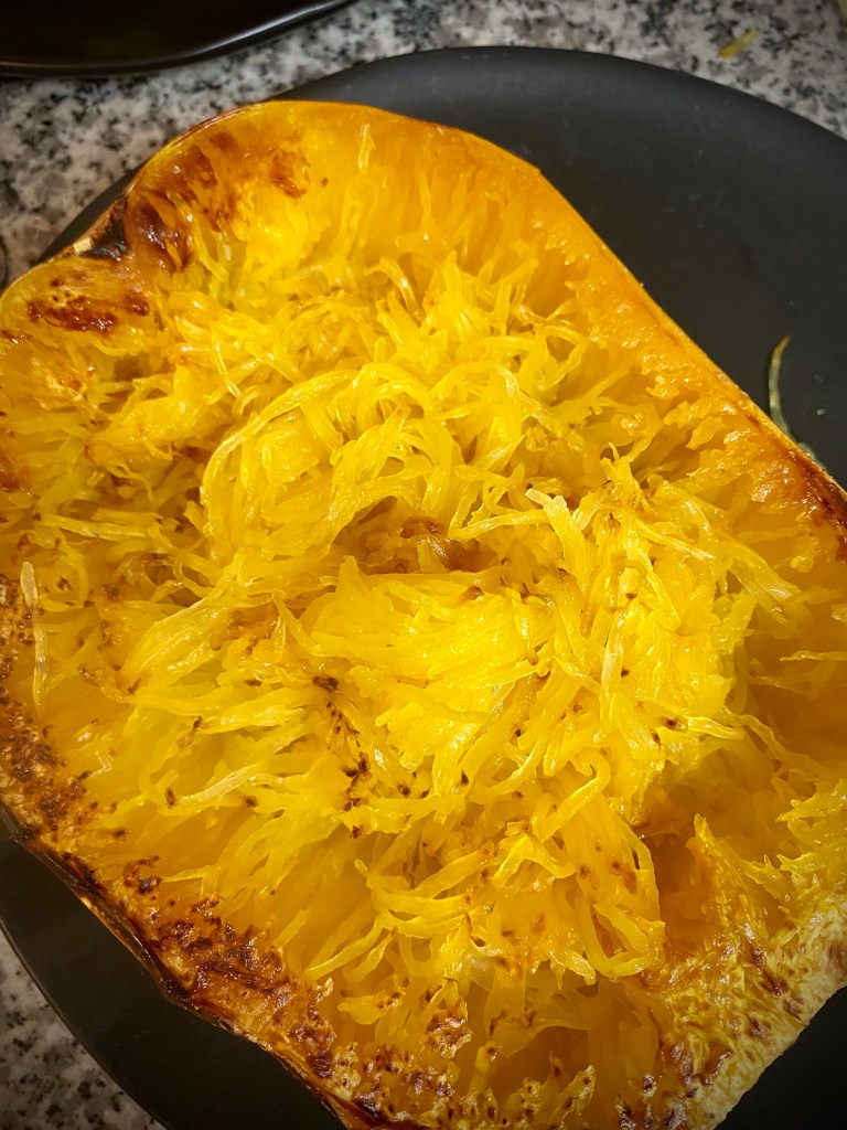 A LOW CARB *pasta dinner?!* How is that even possible!? My Spaghetti Squash boats are the most amazing #pasta alternative! Slurpy, carby and delicious - try this #keto Italian feast today! #lowcarb #glutenfree #paleo #specificcarbohydratediet #healthyfood #italian #food #recipe 