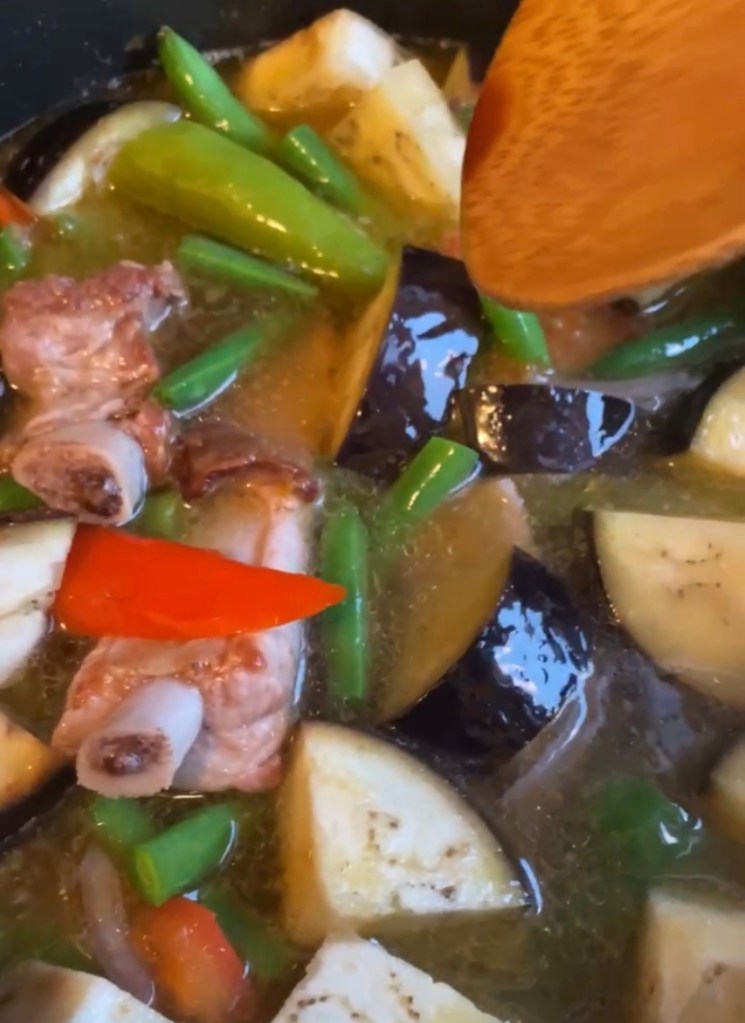 Filipino Sinigang! This healthy pork and vegetable sour soup is one of a kind, and super delicious! This traditional dish from the Philippines will be your new favorite! #food #sinigang #filipino #philippines #cooking #glutenfree #paleo #keto #soup #recipe 