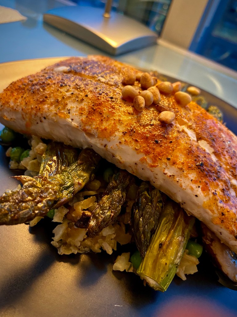 Grits just went KETO! Whaaat?! That's right! Succulent halibut filets get the cajun treatment, with cauliflower grits! It's a delicious gluten free dinner that'll have you singing for your supper! #keto #glutenfree #lowcarb #paleo #food #dinner #recipe #healthyfood #specificcarbohydratediet #cooking