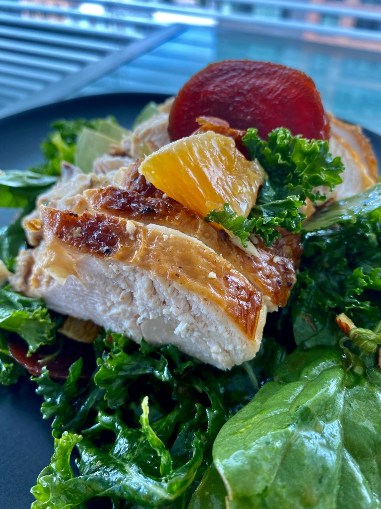 An OUTRAGEOUSLY delicious recipe that's a copycat from a high-end, popular NYC brunch spot! This Citrus Chicken Kale Salad is kissed with juicy orange, buttery avocado, crunchy almonds and hearty beets! And is Keto, Paleo and Gluten Free! #healthy #food 