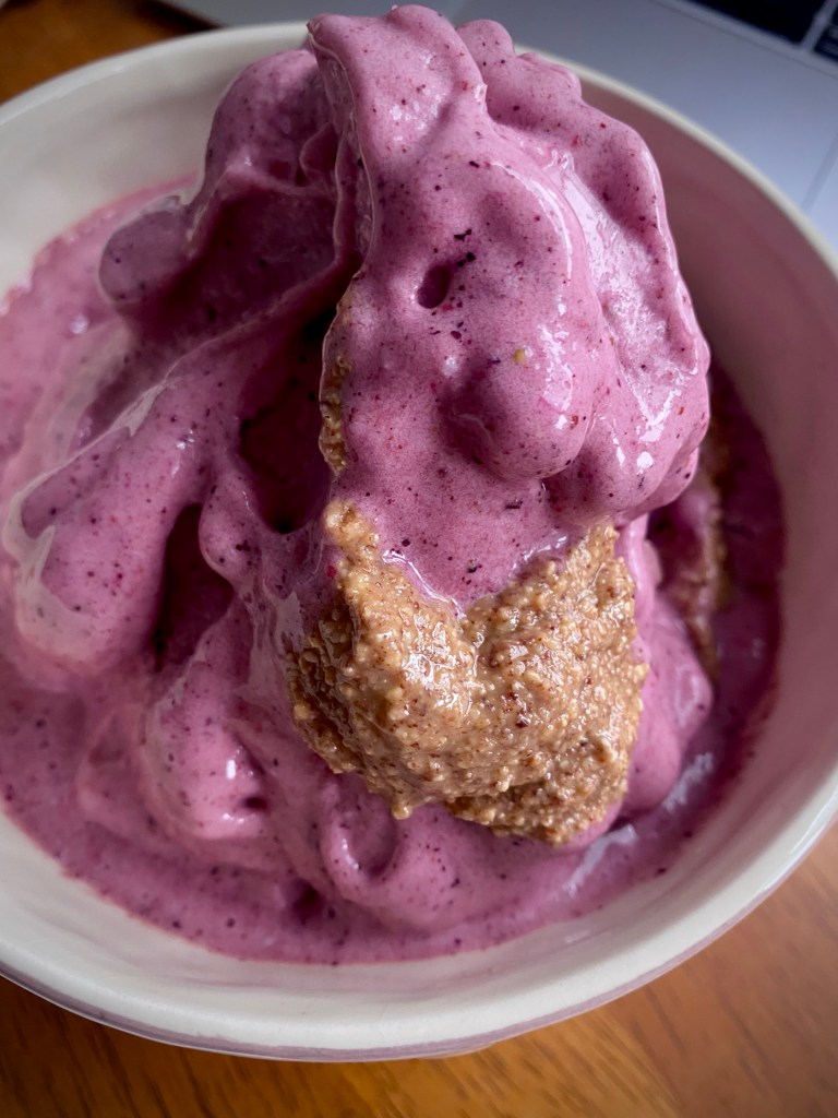 The most AMAZING summer dessert is here! BLUEBERRY PIE ICE CREAM! And topped with almond butter, it is OUT OF THIS WORLD! #vegan #glutenfree #healthyfood #recipe #dessert #icecream #summer #food #recipe #family