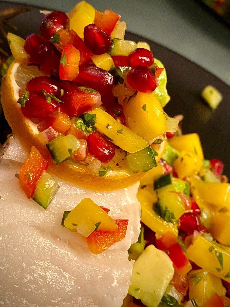 A colorful and delightfully delicious dinner! Sea Bass with Mango Pomegranate Salsa! This healthy and gluten free recipe is bursting with flavor and absolutely beautiful! A #dinner party meal for sure! #food #recipe #glutenfree #paleo #lowcarb #healthyfood #health #cooking #edrecovery