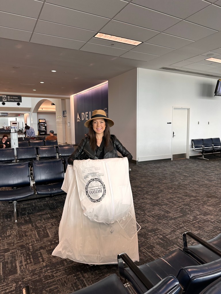 Flying with my wedding dress from NYC to Ohio was quite the debacle! Here are my tips, plus the saga of it all! #engaged #engagememt #bridetobe #wedding #weddingdress #travel #flying #traveltips #life #gettingmarried