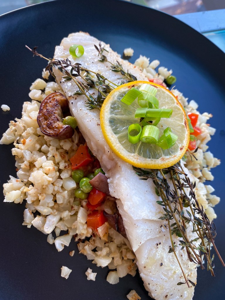 Keto never tasted this good! Italian Eggplant Pilaf! A decadently delicious cauliflower rice pilaf with Italian veggies, and topped with succulent Chilean sea bass! This gluten free and paleo dinner will be a family favorite! #food #cooking #health #healthyfood #keto #paleo #glutenfree #dairyfree #specificcarbohydratediet #dinner