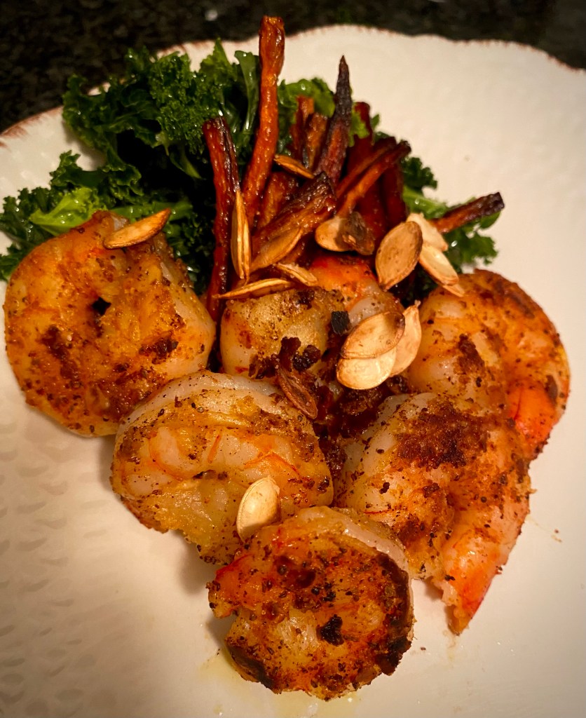 The humble carrot is dressed to the nines in my Sriracha Honey Glazed Carrots! Sweet and Spicy carrots will steal the show for dinner! They're #glutenfree and absolutely bursting with flavor! #vegetarian #food #recipe #cooking #carrots #healthy #healthyfood #dinner #grainfree