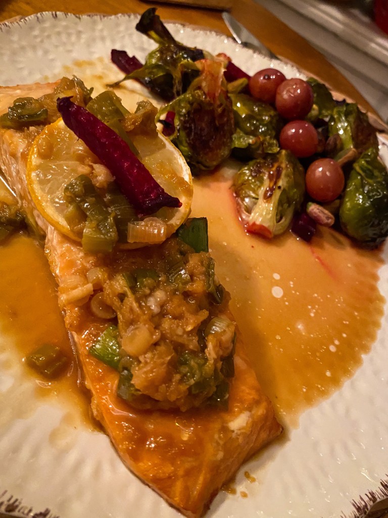 This AMAZING date night dinner is restaurant quality and is SO EASY! My Ginger Salmon with Prosecco Brussels Sprouts is beautiful, delicious and super healthy! And the secret: marinating the salmon! This makes it so flavorful, AND it doubles as a sauce after you boil it!! #salmon #fish #seafood #glutenfree #lowcarb #specificcarbohydratediet #healthyfood #dinner #recipe #dairyfree