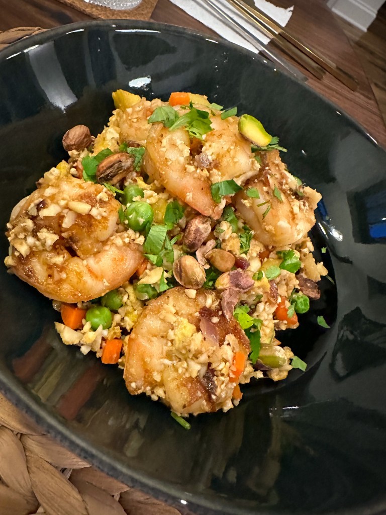 Did you know you can make fried rice out of CAULIFLOWER?! That’s right! This low carb #cooking hack is absolutely delicious! #food #dinner #glutenfree #keto #paleo #lowcarb #specificcarbohydratediet #healthyfood #shrimp