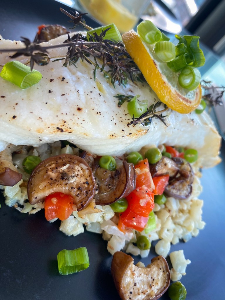 Keto never tasted this good! Italian Eggplant Pilaf! A decadently delicious cauliflower rice pilaf with Italian veggies, and topped with succulent Chilean sea bass! This gluten free and paleo dinner will be a family favorite! #food #cooking #health #healthyfood #keto #paleo #glutenfree #dairyfree #specificcarbohydratediet #dinner