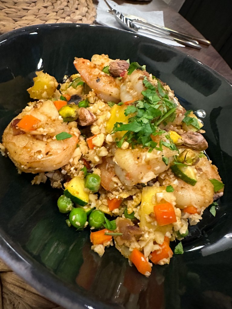 Did you know you can make fried rice out of CAULIFLOWER?! That’s right! This low carb #cooking hack is absolutely delicious! #food #dinner #glutenfree #keto #paleo #lowcarb #specificcarbohydratediet #healthyfood #shrimp