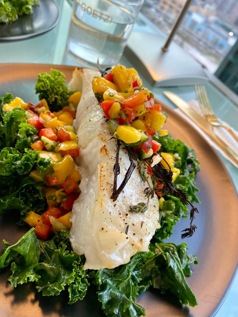 Need to “wow” someone with your cooking skills? THIS IS THE RECIPE! Chilean Sea Bass with Mango Salsa! This gluten free and paleo recipe is a crowd pleaser! Perfect for a dinner party, is make-ahead friendly and super fast and easy! PLUS ITS DANG DELICIOUS! #food #cooking #healthyfood #paleo #kale #edrecovery #recipe #health #dairyfree #dinner
