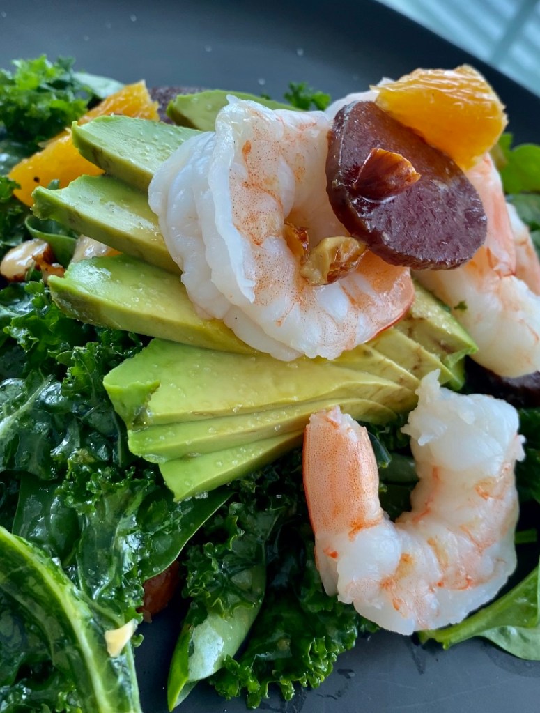 An OUTRAGEOUSLY delicious recipe that's a copycat from a high-end, popular NYC brunch spot! This Citrus Chicken Kale Salad is kissed with juicy orange, buttery avocado, crunchy almonds and hearty beets! And is Keto, Paleo and Gluten Free! #healthy #food 