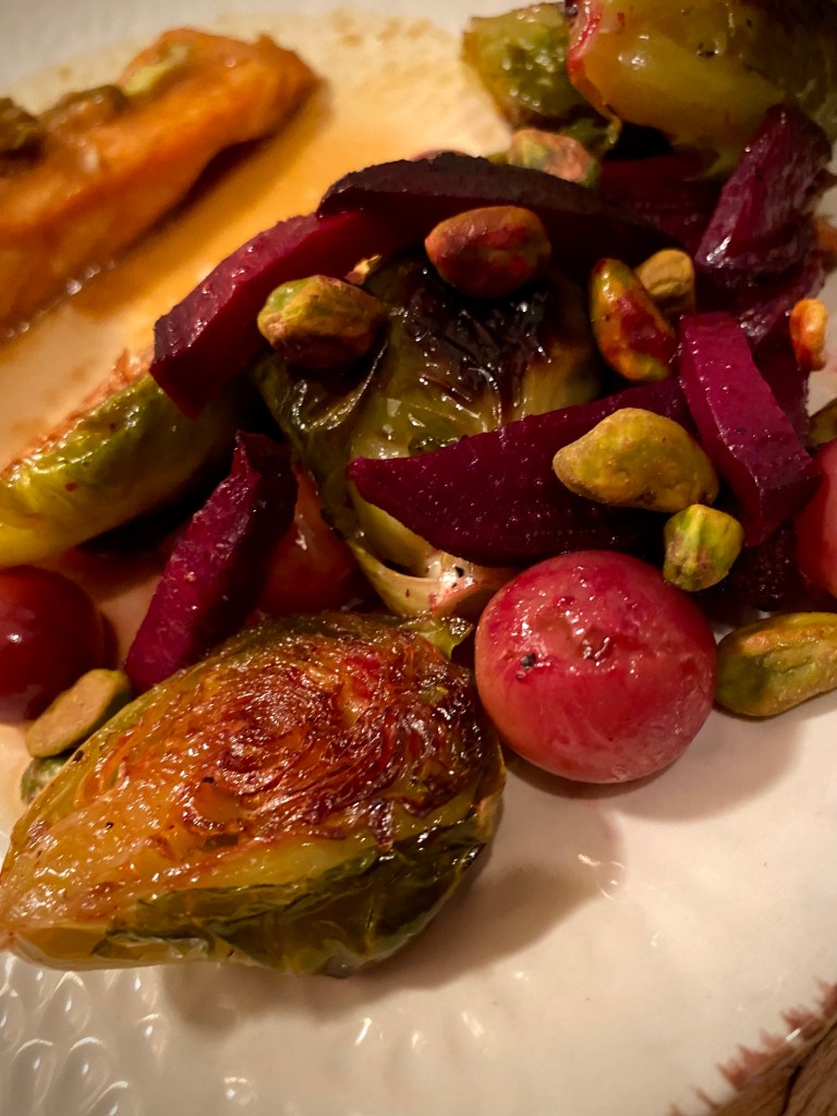 This AMAZING date night dinner is restaurant quality and is SO EASY! My Ginger Salmon with Prosecco Brussels Sprouts is beautiful, delicious and super healthy! And the secret: marinating the salmon! This makes it so flavorful, AND it doubles as a sauce after you boil it!! #salmon #fish #seafood #glutenfree #lowcarb #specificcarbohydratediet #healthyfood #dinner #recipe #dairyfree