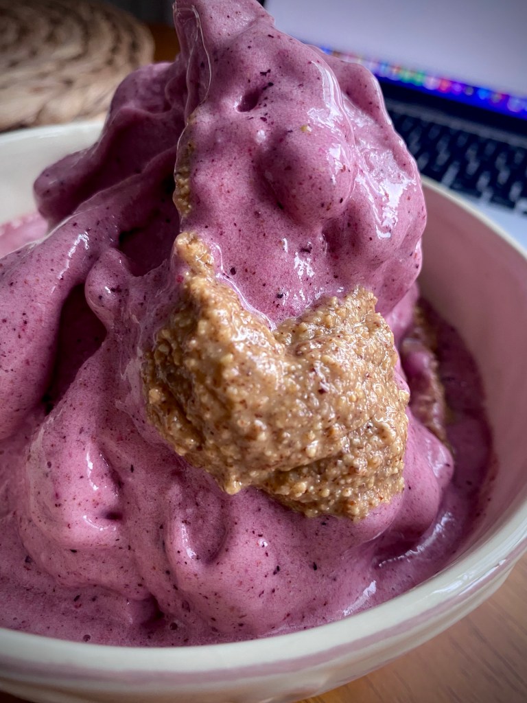 The most AMAZING summer dessert is here! BLUEBERRY PIE ICE CREAM! And topped with almond butter, it is OUT OF THIS WORLD! #vegan #glutenfree #healthyfood #recipe #dessert #icecream #summer #food #recipe #family