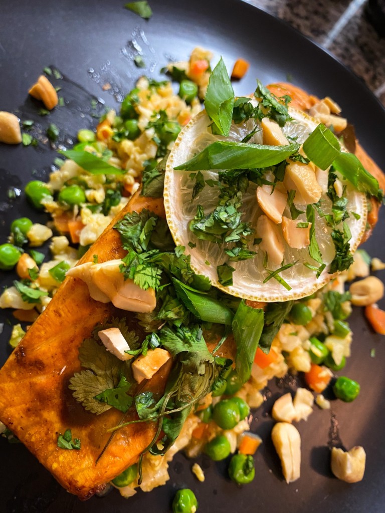 My Tiger Salmon with Sweet Chili Fried Rice recipe is OUTRAGEOUSLY DELICiOUS and is full of my cooking secrets: 1) Marinating salmon before cooking. 2) Stirring in a flavorful sauce to your fried rice right before serving. #glutenfree #keto #lowcarb #dinner #cooking #food #healthyfood #yummy #salmon #scd