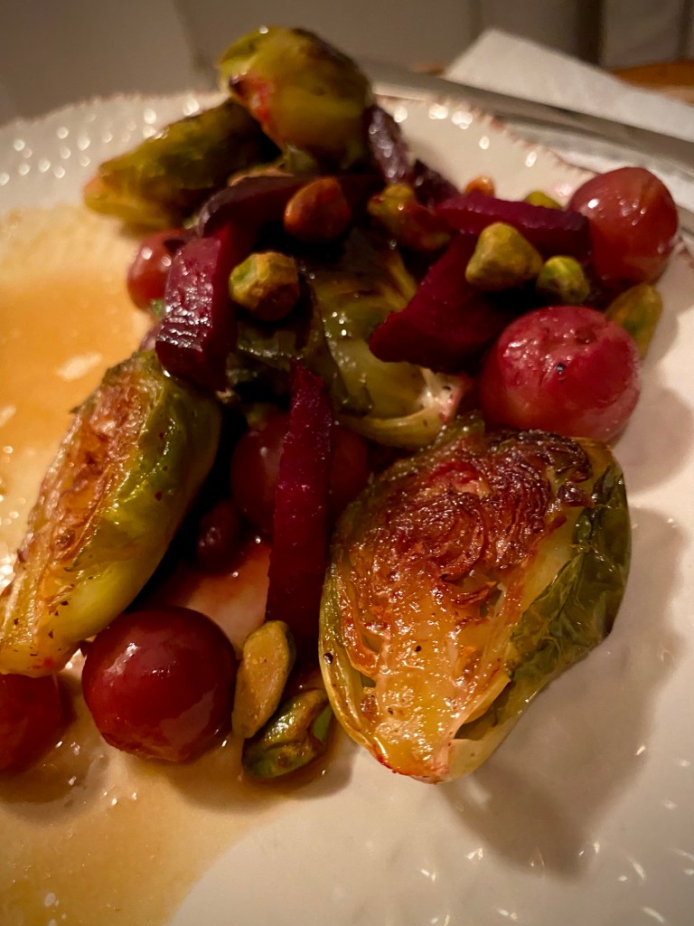 This AMAZING date night dinner is restaurant quality and is SO EASY! My Ginger Salmon with Prosecco Brussels Sprouts is beautiful, delicious and super healthy! And the secret: marinating the salmon! This makes it so flavorful, AND it doubles as a sauce after you boil it!! #salmon #fish #seafood #glutenfree #lowcarb #specificcarbohydratediet #healthyfood #dinner #recipe #dairyfree