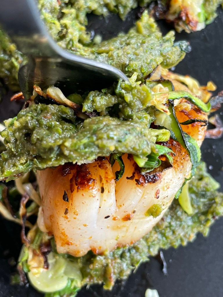 The most delicious, fast and easy dinner! Scallop Pesto Pasta! Pan seared scallops with zucchini noodles, tossed with homemade pesto — a keto and paleo dinner of dreams! Gluten free and dairy free too! #food #keto #edrecovery #cooking #recipe #paleo #pesto #glutenfree #healthyfood #cleaneating 