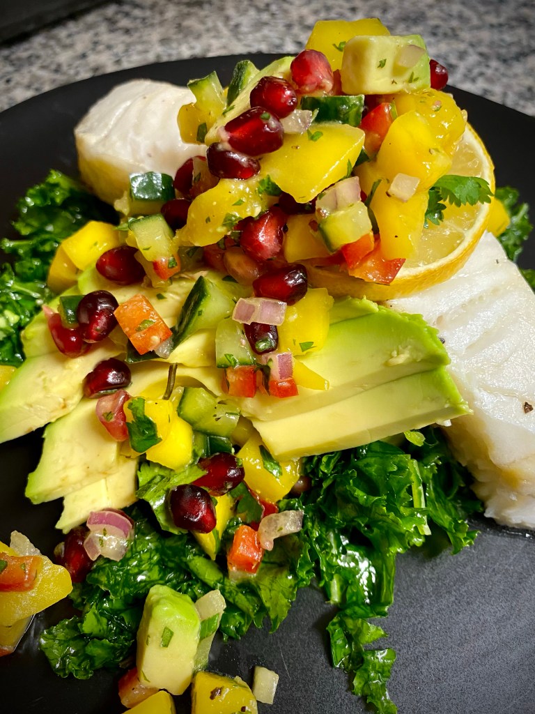 A colorful and delightfully delicious dinner! Sea Bass with Mango Pomegranate Salsa! This healthy and gluten free recipe is bursting with flavor and absolutely beautiful! A #dinner party meal for sure! #food #recipe #glutenfree #paleo #lowcarb #healthyfood #health #cooking #edrecovery