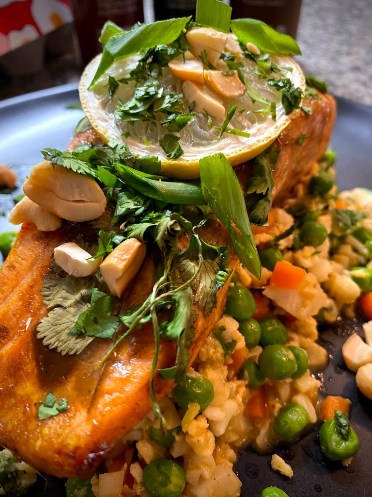 My Tiger Salmon with Sweet Chili Fried Rice recipe is OUTRAGEOUSLY DELICiOUS and is full of my cooking secrets: 1) Marinating salmon before cooking. 2) Stirring in a flavorful sauce to your fried rice right before serving. #glutenfree #keto #lowcarb #dinner #cooking #food #healthyfood #yummy #salmon #scd