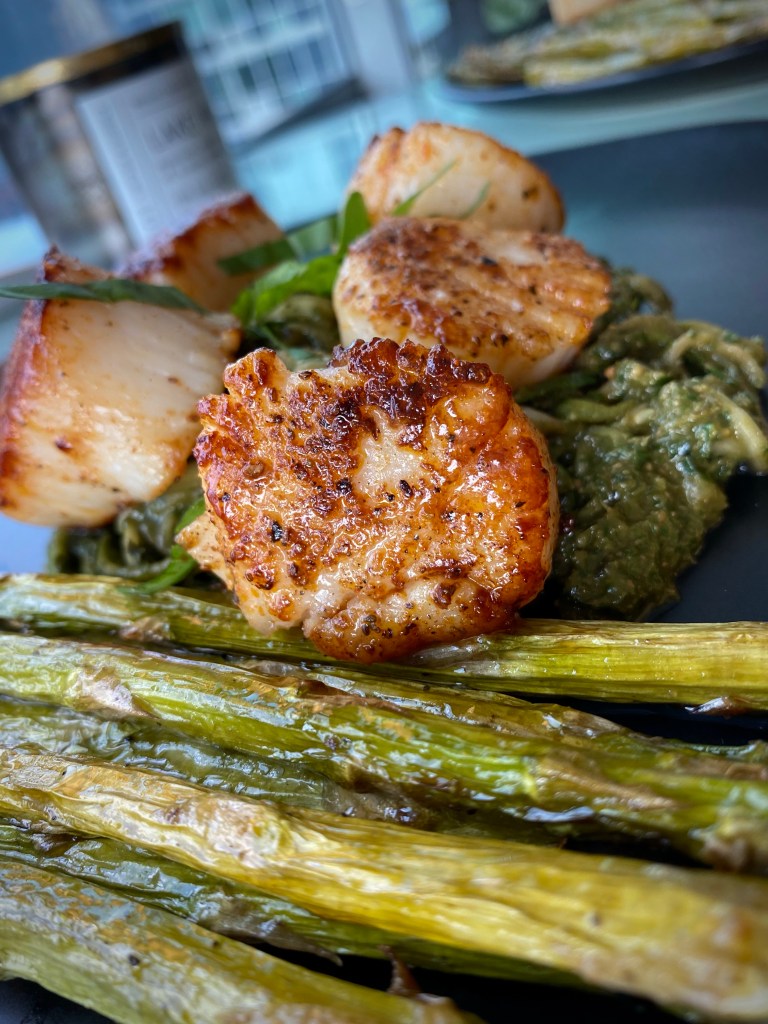 The most delicious, fast and easy dinner! Scallop Pesto Pasta! Pan seared scallops with zucchini noodles, tossed with homemade pesto — a keto and paleo dinner of dreams! Gluten free and dairy free too! #food #keto #edrecovery #cooking #recipe #paleo #pesto #glutenfree #healthyfood #cleaneating 