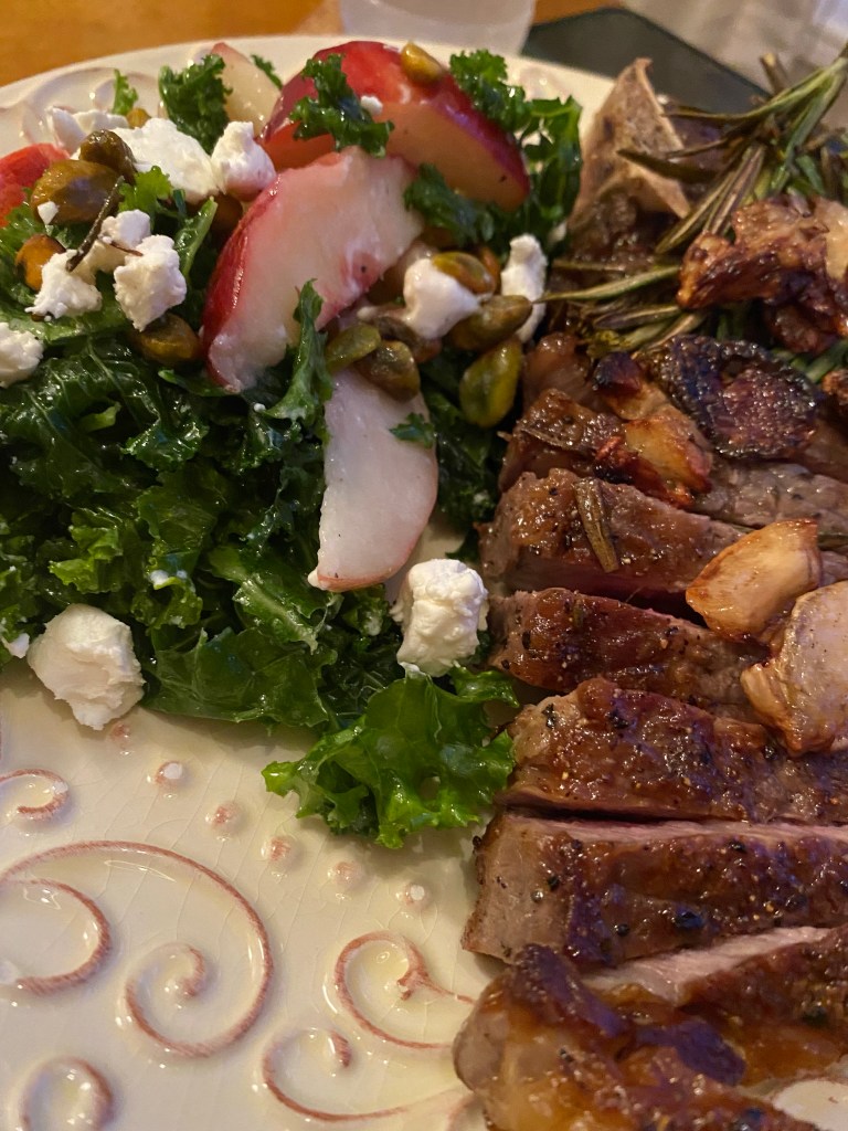 A #summer salad that is a CROWD PLEASER! Sweet, juicy peaches join forces with tangy goat cheese and crunchy pistachios in this #healthy #kale salad! Serve with a fabulous steak, and you've got a #Paleo meal for the ages! #food #recipe #glutenfree #vegetarian #lowcarb #edrecovery