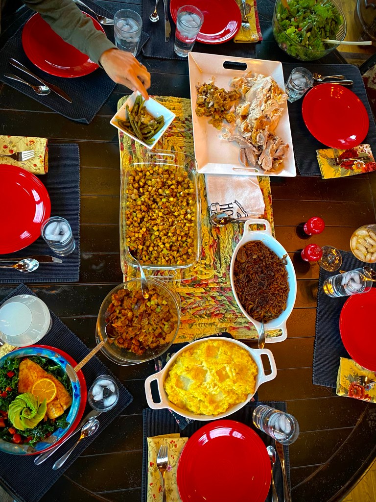 A PHENOMENAL and nutrient dense dinner! Cajun Avocado Salad with Baked Snapper! This gluten free, keto and paleo dinner will have everyone at the table oohing and aahing over its beauty -- and it's deliciousness! #glutenfree #food #paleo #specificcarbohydratediet #fish #salad #kale #healthyfood #lowcarb #avocado