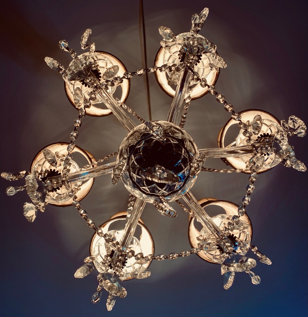 After cleaning ten years of grime off my crystal chandelier, I realized that that’s what God had done with me in my recovery from anorexia. A powerful take on a mundane task. #recovery #catholic #anorexia #eatingdisorder #edrecovery #healing #mentalhealth #faith #god #christianity