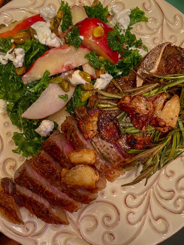 A #summer salad that is a CROWD PLEASER! Sweet, juicy peaches join forces with tangy goat cheese and crunchy pistachios in this #healthy #kale salad! Serve with a fabulous steak, and you've got a #Paleo meal for the ages! #food #recipe #glutenfree #vegetarian #lowcarb #edrecovery