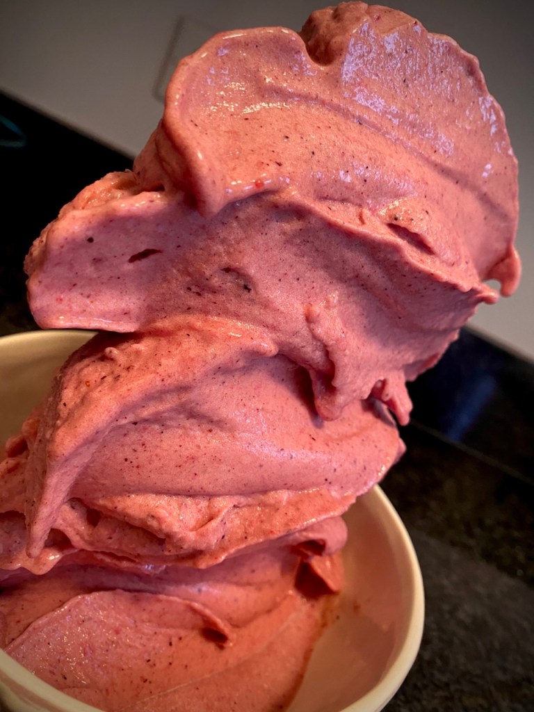 This is my ALL TIME FAVORITE FOOD! Sunshine Ice Cream! Made from frozen bananas, it's hard to believe this decadent treat is HEALTHY! Make this tonight! #dessert #food #recipe #cooking #healthy #healthyfood #yum #sweet #nicecream #summer 