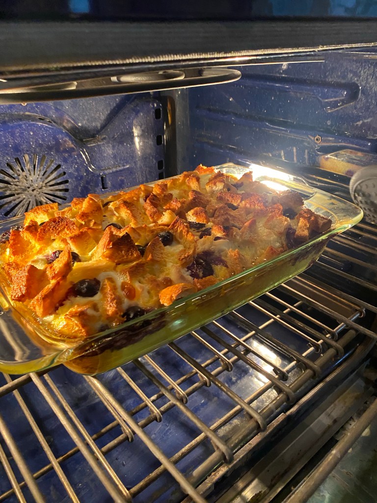 The most decadent Baked French Toast Casserole - stuffed with pockets of sweet cream cheese and fresh blueberries! The perfect start to your Christmas morning! #recipe #food #brunch #breakfast #christmas #holiday #baking #sweets #yummy #yum