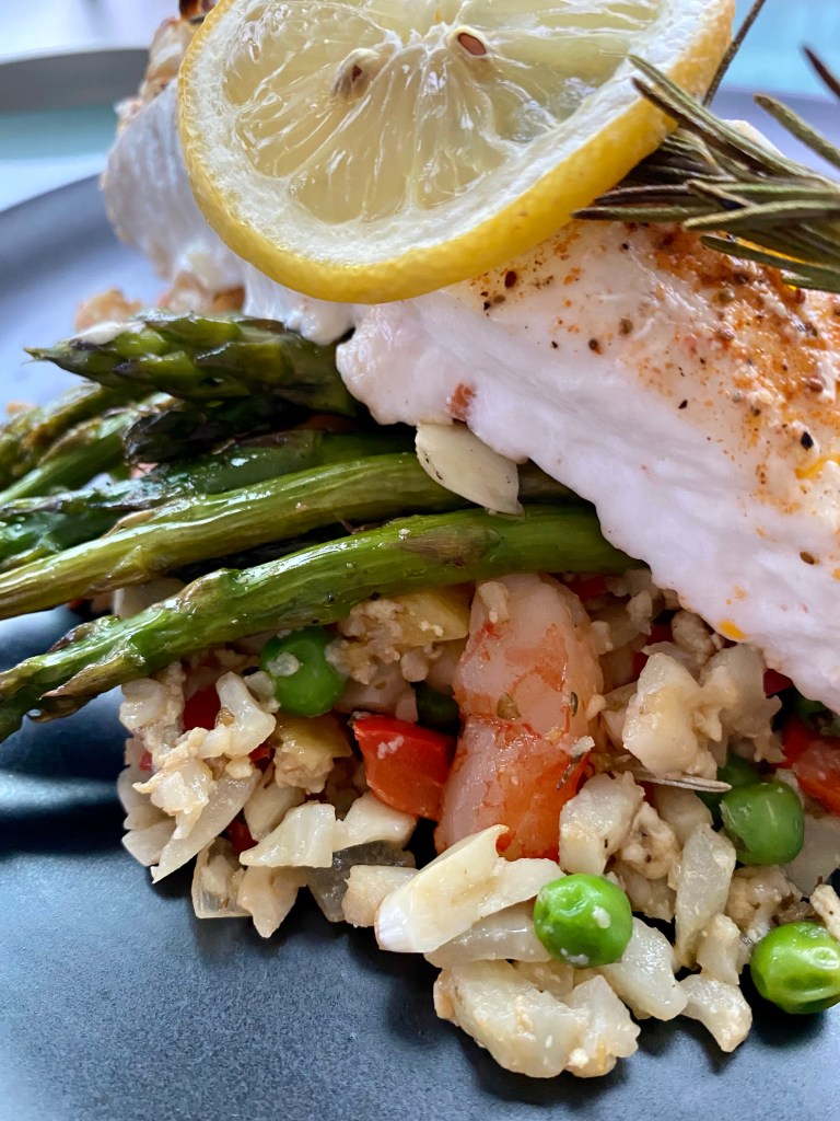 A healthy and delicious KETO dinner! Amazing fried rice made from CAULIFLOWER! It may be low carb, but this meal is high flavor! Bursting with meaty shrimp and juicy pineapple, this quick and easy meal will become a family favorite! #keto #food #paleo #glutenfree #grainfree #shrimp #edrecovery #friedrice #recipe #yum