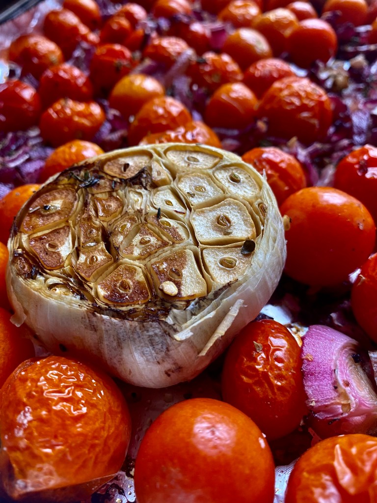 A delicious tomato soup recipe with roasted garlic! This amazing gluten free soup is healthy and packed with flavor! It will be your family’s new favorite dinner! #healthyfood #food #recipe #tomatosoup #soup #glutenfree #paleo #keto #lowcarb 