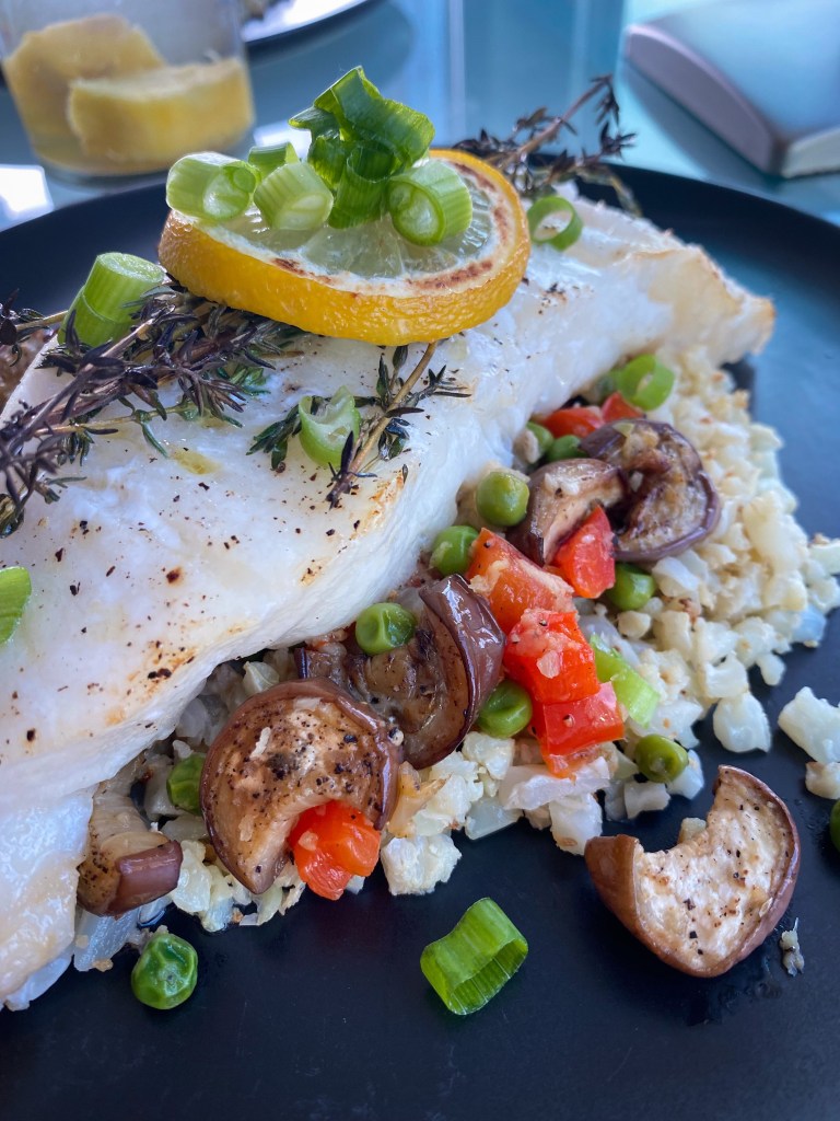 Keto never tasted this good! Italian Eggplant Pilaf! A decadently delicious cauliflower rice pilaf with Italian veggies, and topped with succulent Chilean sea bass! This gluten free and paleo dinner will be a family favorite! #food #cooking #health #healthyfood #keto #paleo #glutenfree #dairyfree #specificcarbohydratediet #dinner