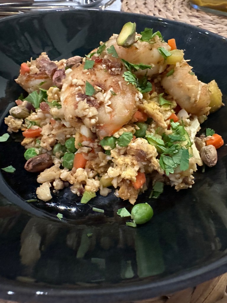 Did you know you can make fried rice out of CAULIFLOWER?! That’s right! This low carb #cooking hack is absolutely delicious! #food #dinner #glutenfree #keto #paleo #lowcarb #specificcarbohydratediet #healthyfood #shrimp