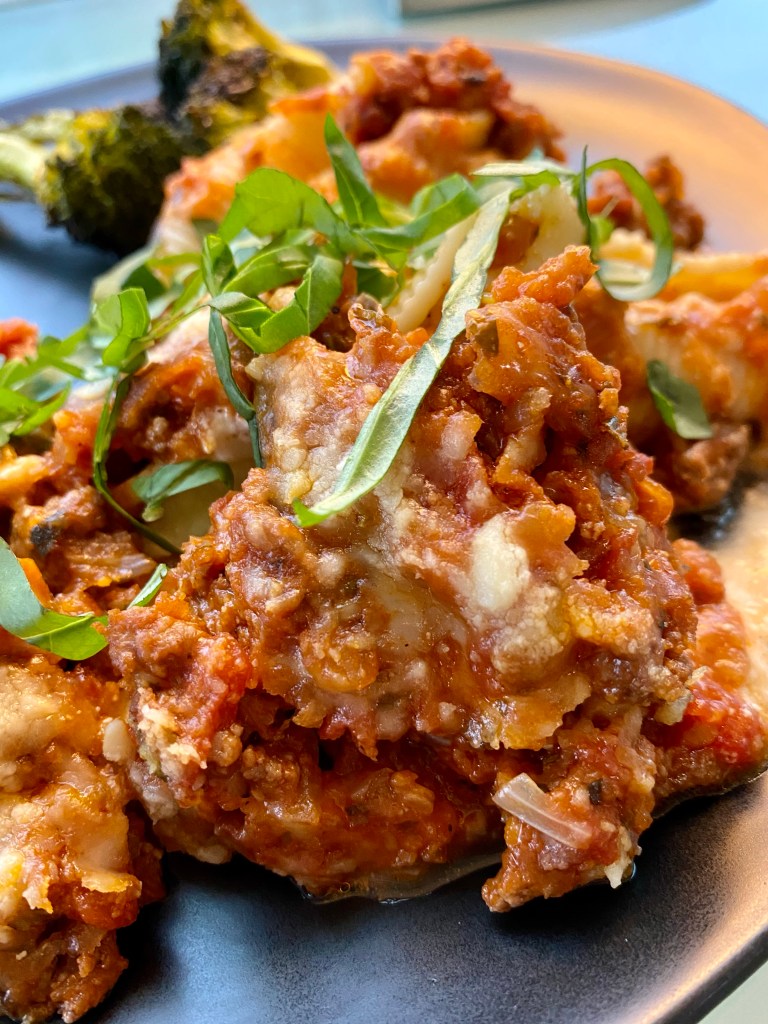 Delicious and healthy Cheesy Stuffed Shells the whole family will love! This easy weeknight dinner is great for LEFTOVERS! Which means, cook once, and enjoy all week! #food #family #recipes #pasta #italian #healthyfood #dinner 