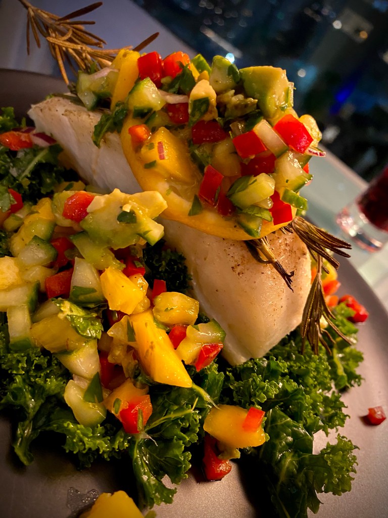 A #healthy and delicious date night recipe! Sea Bass with #Tropical Salsa! Juicy pineapple and sweet mango are front and center in this gorgeous and tasty #dinner! #food #glutenfree #healthyfood #paleo #cooking #datenight 