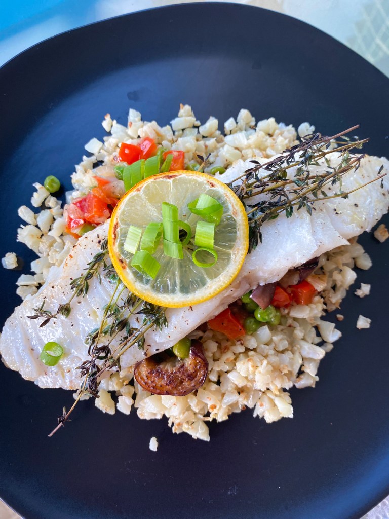 Keto never tasted this good! Italian Eggplant Pilaf! A decadently delicious cauliflower rice pilaf with Italian veggies, and topped with succulent Chilean sea bass! This gluten free and paleo dinner will be a family favorite! #food #cooking #health #healthyfood #keto #paleo #glutenfree #dairyfree #specificcarbohydratediet #dinner